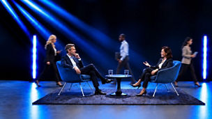 Business people sitting on chairs