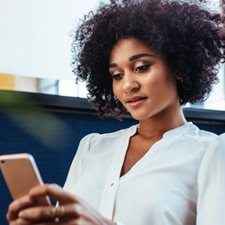 Business woman looking at phone banner
