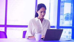 business woman working on a laptop