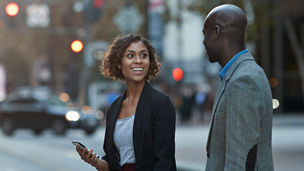Businesspeople walking and talking on avenue of san francisco: Banner