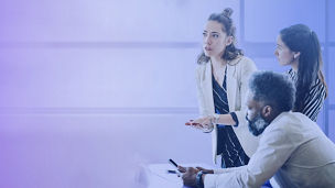 Businesswoman leading a project meeting with co-workers
