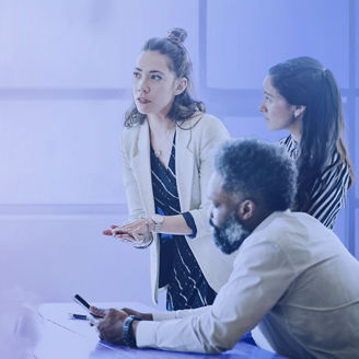 Businesswoman leading a project meeting with co-workers