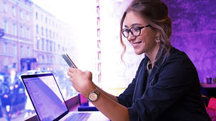 Businesswoman working in café