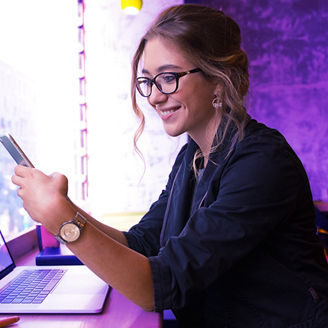 Businesswoman working in café