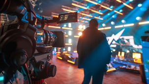 Person standing before camera