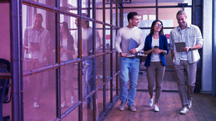 woman smiling at desk