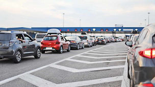 cars lined up at toll