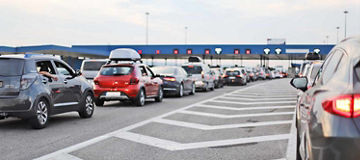 Cars lined up at a toll