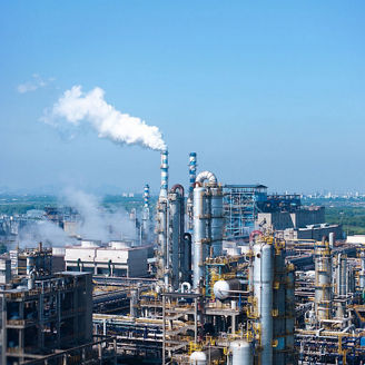 Factory and smoking chimneys