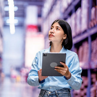 woman on her tablet checking supply