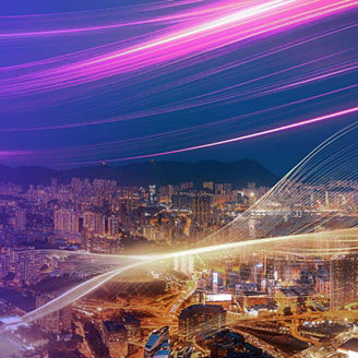 Night city skyline with bright trails of light