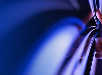 Closeup of a hand touching a computer touchscreen