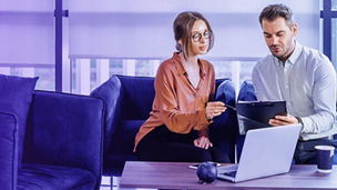 colleagues dicussing in office banner