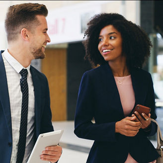 colleagues-discussing-while-walking