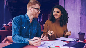 colleagues discussing work together