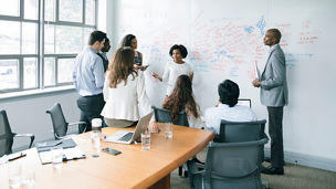 Colleagues in meeting room