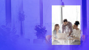 Colleagues sitting at computer