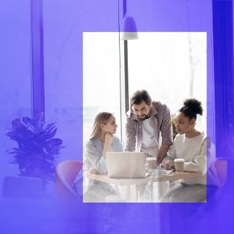 Colleagues sitting at computer