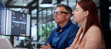 Digital Accountant Processing E-invoice On Desktop Monitor In Office.