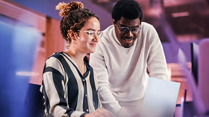 colleagues working together on a laptop