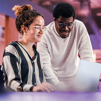 colleagues working together on a laptop