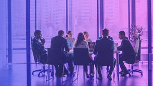 colleagues having a meeting at the table
