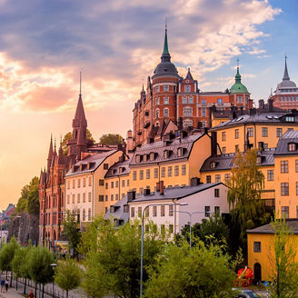 Colorful waterfront buildings at sunset