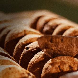 Freshly baked bread coming out of the oven