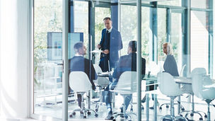 Full length shot of a group of corporate businesspeople meeting in the boardroom