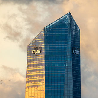 Madrid, Spain - December 10, 2021: KPMG Tower in Cuatro Torres Business Area. View at sunset