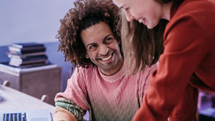 Man and woman laughing