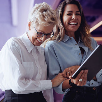 Two woman laughing