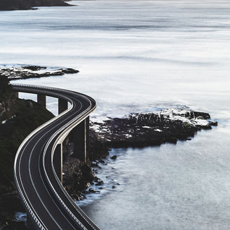 Curved bridge along sea