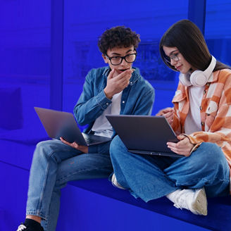 colleagues looking at computer