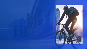 Cyclist in KPMG Blue