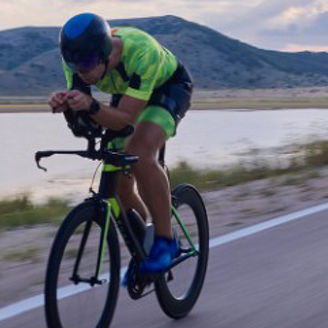 Cyclist on scenic road banner