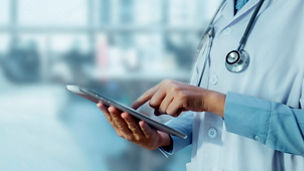 Medicine doctor touching tablet. Medical technology and futuristic concept.