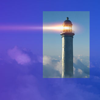 Lighthouse surrounded by clouds