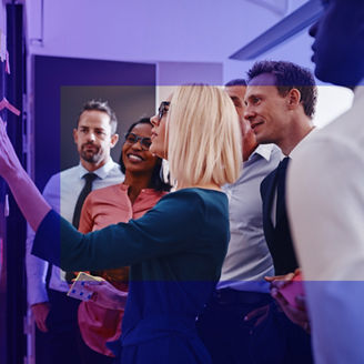 Girl smiling in a group meeting