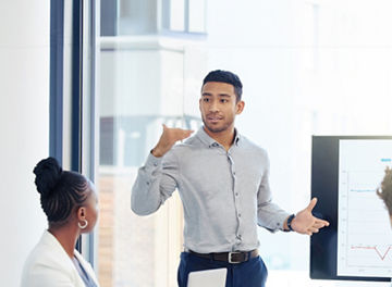 People having an meeting inside an office