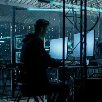 Teenage boy hacking a server