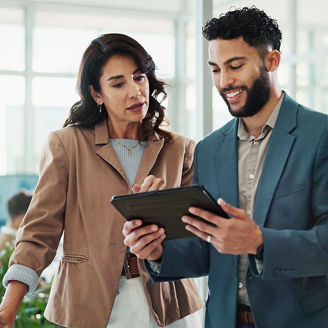 man-woman-looking-at-screen