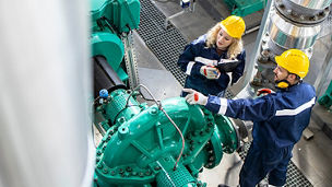 Factory workers having discussion