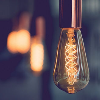 Vintage electric light.Decorative antique edison style light bulbs in coffee shop.vintage tone