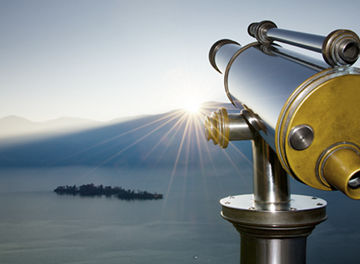 Telescope in front of mountains