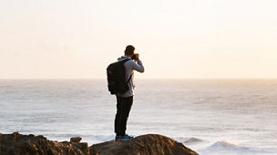 man standing on shore