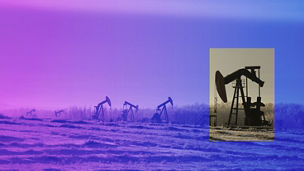 A field with oil pump jacks surrounded by greenery under a cloudy sky and sunlight