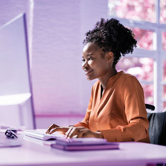 Woman Using Computer. Worker With Disability.