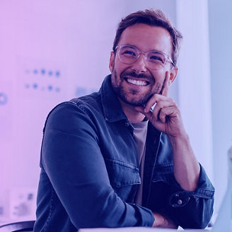 man with glasses smiling