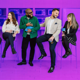 Five work collegues sitting at a bar
